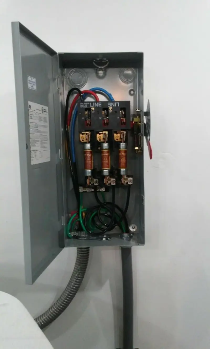 Three-phase disconnect switch installed for Smoke Detector Installation in New Hanover